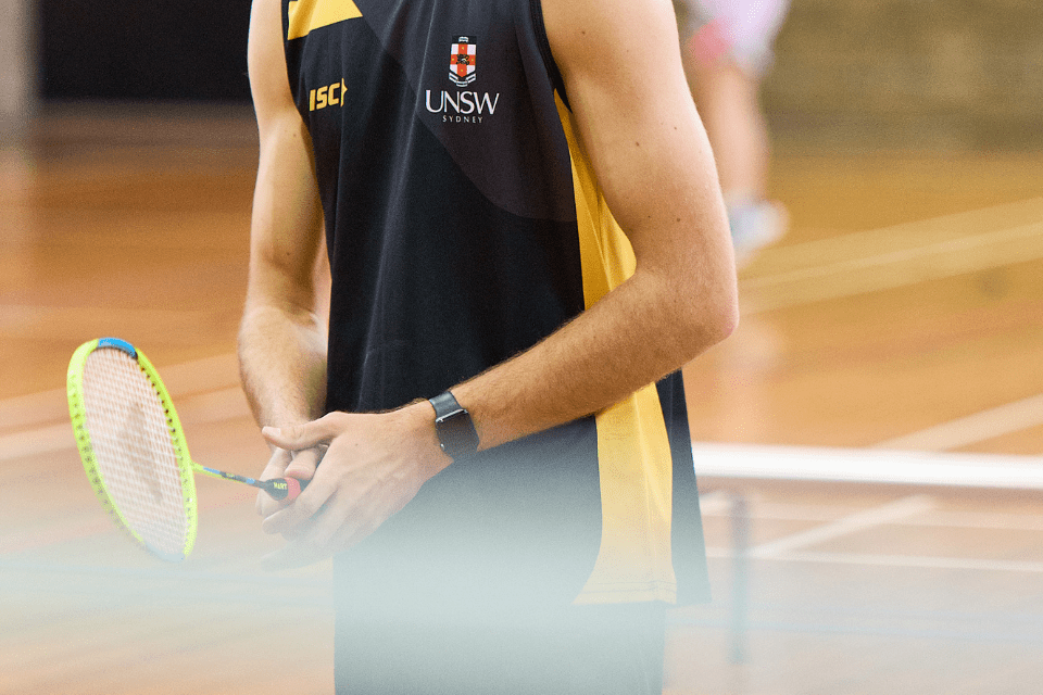 boy playing badminton